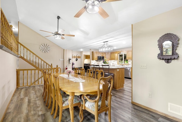 843 Northdale Blvd NW, Coon Rapids, MN 55448 - dining space with ceiling fan, wood finished floors, stairs, and baseboards