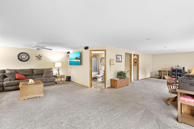 843 Northdale Blvd NW, Coon Rapids, MN 55448 - carpeted living area with a ceiling fan, a textured ceiling, and baseboards