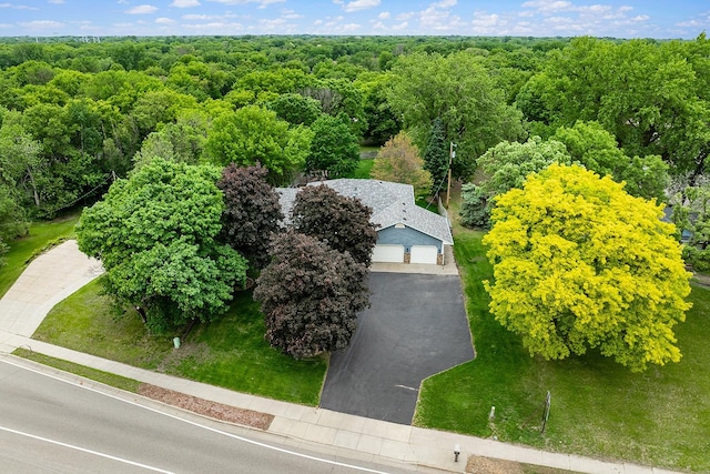 843 Northdale Blvd NW, Coon Rapids, MN 55448 - view of subject property featuring a heavily wooded area