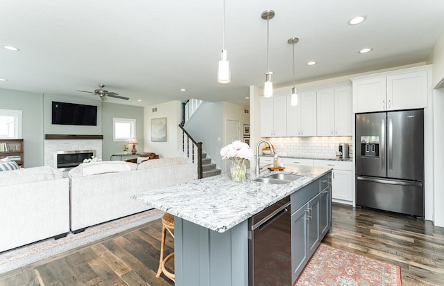 927 Southwell Enclave NE, Byron, MN 55920 - kitchen featuring stainless steel appliances, a sink, white cabinetry, ceiling fan, and recessed lighting