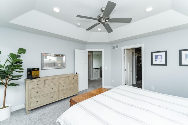 927 Southwell Enclave NE, Byron, MN 55920 - bedroom featuring light colored carpet, baseboards, recessed lighting, a raised ceiling, and ceiling fan