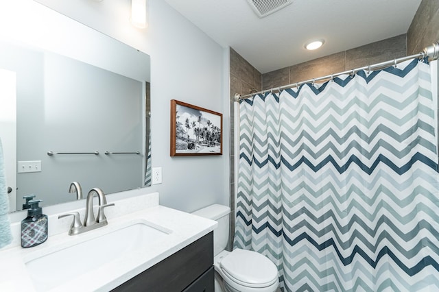927 Southwell Enclave NE, Byron, MN 55920 - bathroom with vanity, toilet, and a shower with curtain