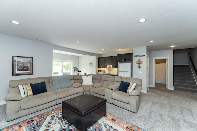 927 Southwell Enclave NE, Byron, MN 55920 - living area featuring recessed lighting, stairs, light colored carpet, and baseboards