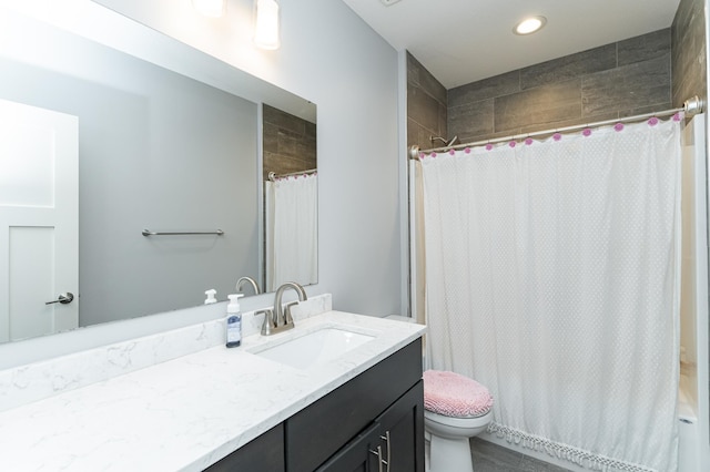 927 Southwell Enclave NE, Byron, MN 55920 - bathroom with vanity, toilet, and recessed lighting