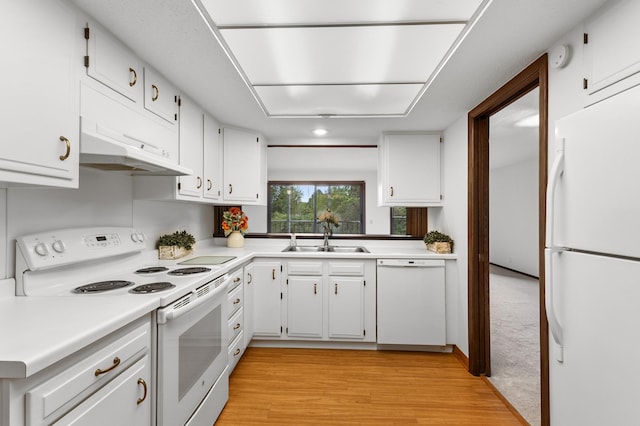 9700 Portland Ave S Unit 237, Bloomington, MN 55420 - kitchen featuring white appliances, a sink, light countertops, and white cabinets