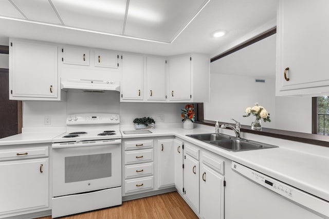 9700 Portland Ave S Unit 237, Bloomington, MN 55420 - kitchen featuring white appliances, under cabinet range hood, a sink, white cabinetry, and recessed lighting