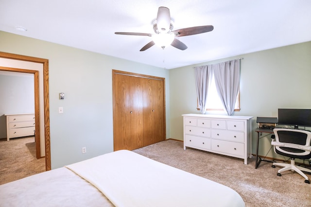 208 Concord St, West Concord, MN 55985 - carpeted bedroom with a closet, a ceiling fan, and a desk