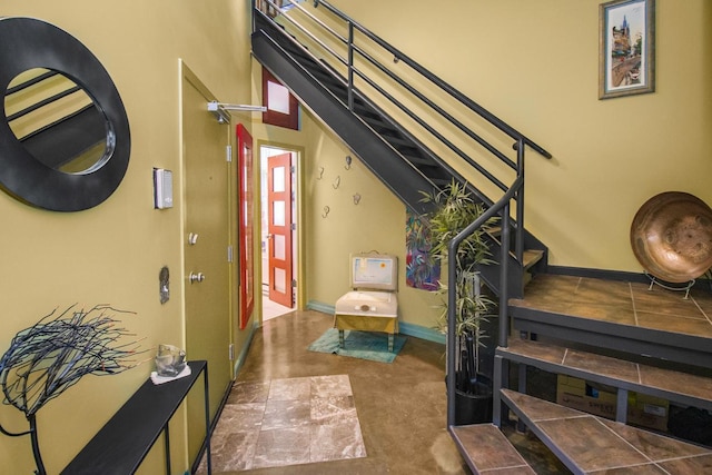 512 Laurel Ave Unit 1, Saint Paul, MN 55102 - staircase featuring baseboards