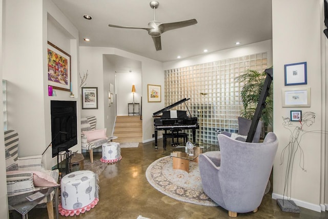 512 Laurel Ave Unit 1, Saint Paul, MN 55102 - living area with finished concrete floors, stairway, a ceiling fan, a fireplace, and recessed lighting