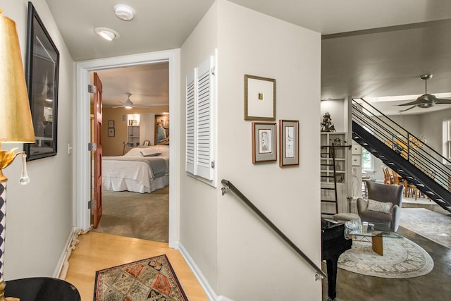 512 Laurel Ave Unit 1, Saint Paul, MN 55102 - corridor featuring stairs and light wood-style floors