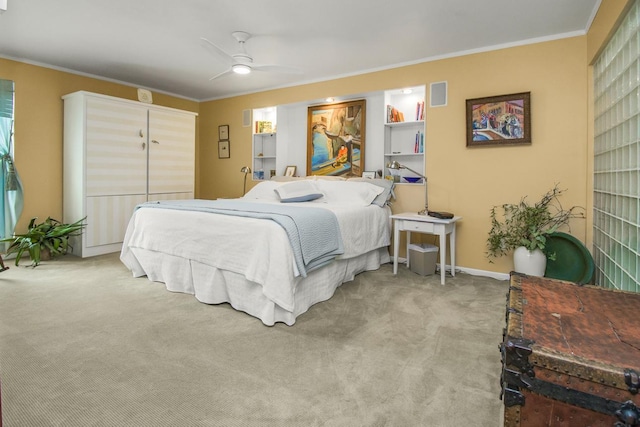 512 Laurel Ave Unit 1, Saint Paul, MN 55102 - bedroom with ornamental molding, light carpet, and ceiling fan