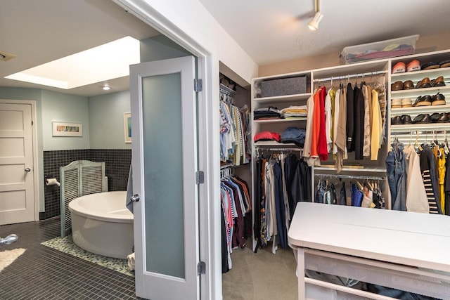 512 Laurel Ave Unit 1, Saint Paul, MN 55102 - walk in closet with tile patterned flooring