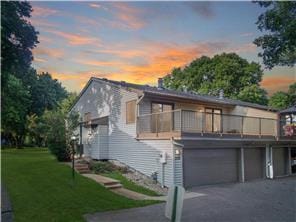 1356 Arden View Dr, Arden Hills, MN 55112 - view of front of home with an attached garage, driveway, a lawn, and a balcony