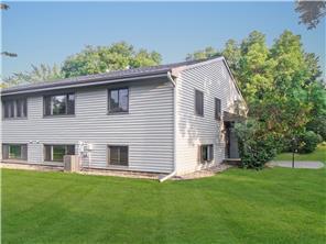 1356 Arden View Dr, Arden Hills, MN 55112 - back of property with a lawn