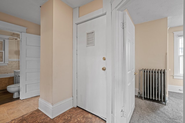 3328 5th Ave S, Minneapolis, MN 55408 - property entrance featuring radiator