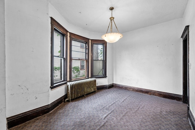 3328 5th Ave S, Minneapolis, MN 55408 - unfurnished room with radiator, carpet flooring, and baseboards
