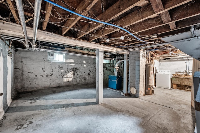 3328 5th Ave S, Minneapolis, MN 55408 - basement featuring washer / clothes dryer and gas water heater