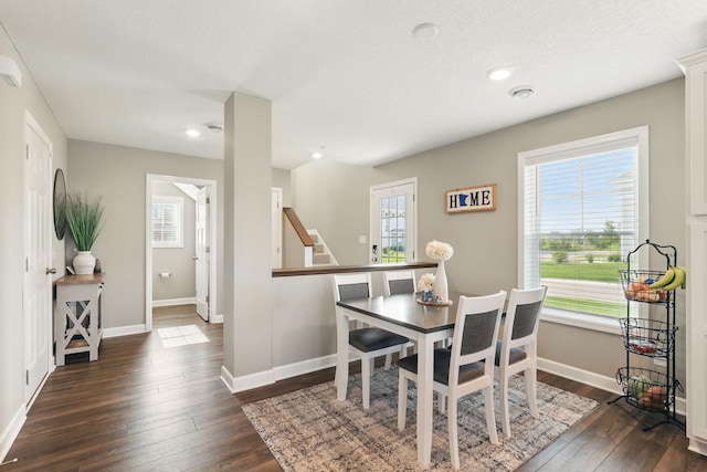 1141 Middlefield Rd, Medina, MN 55340 - dining space with dark wood-type flooring, baseboards, recessed lighting, and stairs