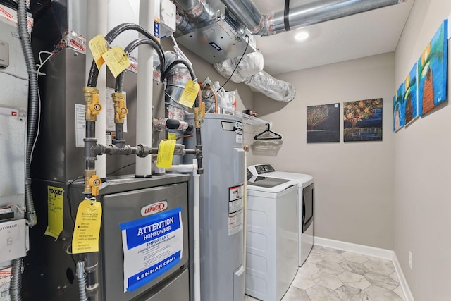 1141 Middlefield Rd, Medina, MN 55340 - utility room featuring washing machine and clothes dryer and water heater