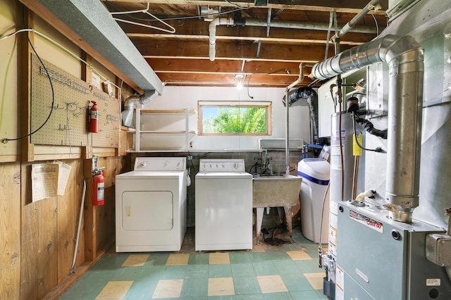 11418 Friar Ln, Minnetonka, MN 55305 - laundry room with tile patterned floors and separate washer and dryer