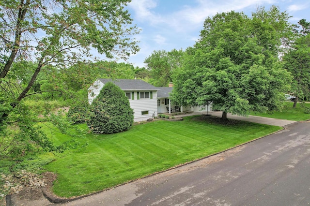 11418 Friar Ln, Minnetonka, MN 55305 - tri-level home with a front lawn and a shingled roof