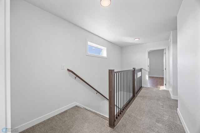 8378 62nd St S, Horace, ND 58047 - hallway featuring an upstairs landing, carpet flooring, and baseboards