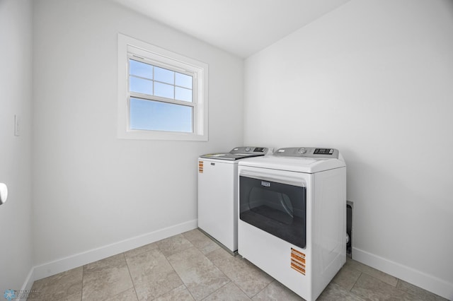8378 62nd St S, Horace, ND 58047 - washroom with washer and clothes dryer and baseboards