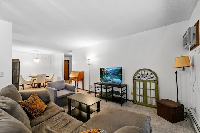 5697 Green Circle Dr Unit 304, Minnetonka, MN 55343 - living room with a baseboard radiator, light carpet, a chandelier, and an AC wall unit