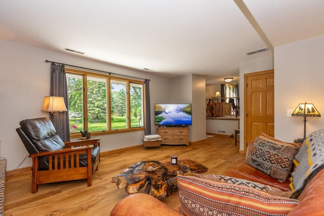 8935 180th St W, Faribault, MN 55021 - living room featuring wood finished floors and baseboards