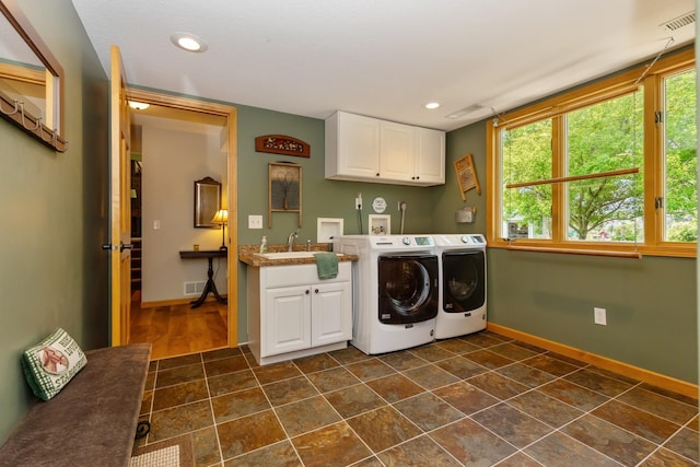 8935 180th St W, Faribault, MN 55021 - laundry area featuring cabinet space, washing machine and clothes dryer, baseboards, recessed lighting, and bar with sink
