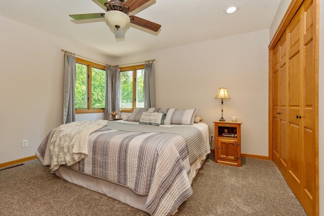 8935 180th St W, Faribault, MN 55021 - carpeted bedroom featuring a closet, baseboards, a ceiling fan, and recessed lighting