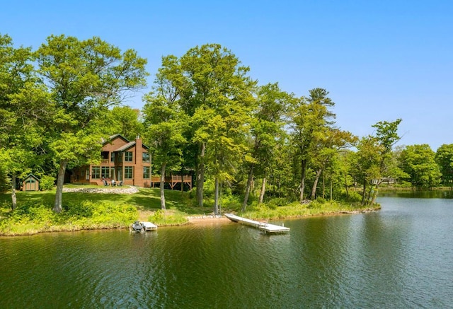 19260 Lakewood Dr, Deerwood Twp, MN 56444 - water view featuring a dock and a heavily wooded area