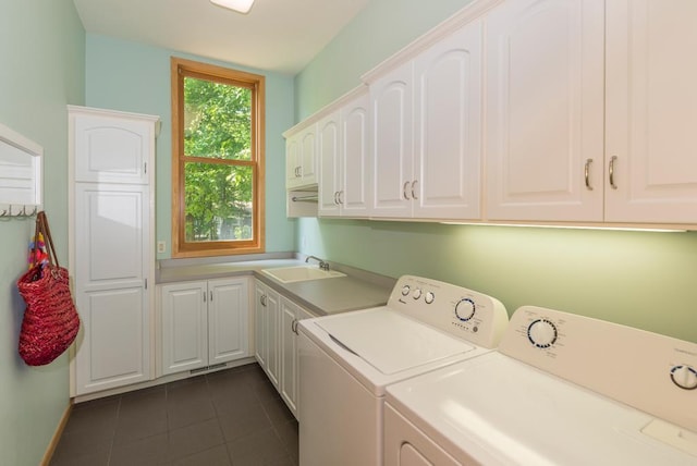 19260 Lakewood Dr, Deerwood Twp, MN 56444 - laundry room with cabinet space, washing machine and dryer, and dark tile patterned floors