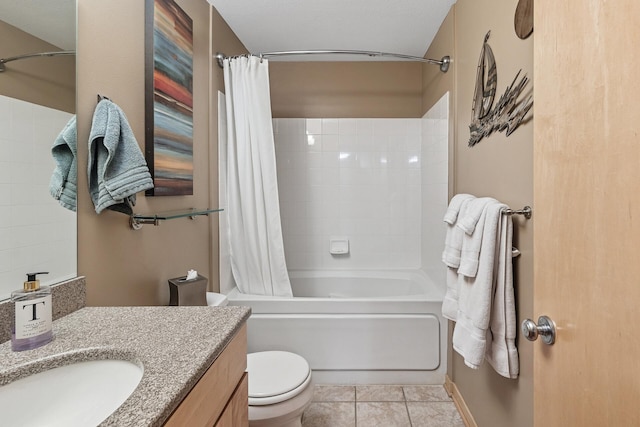 198 Elm St, Saint Paul, MN 55102 - bathroom featuring vanity, shower / bath combo with shower curtain, toilet, and tile patterned floors