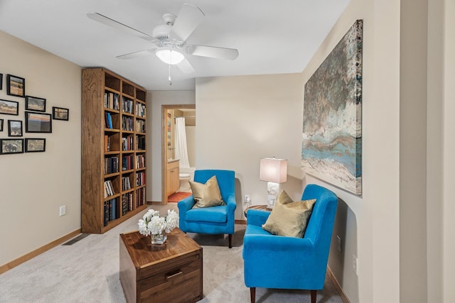 198 Elm St, Saint Paul, MN 55102 - living area featuring ceiling fan, carpet flooring, baseboards, and built in features