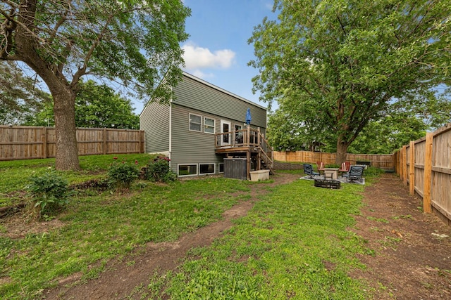 1858 Kennedy Ct, Northfield, MN 55057 - rear view of property featuring a deck, stairway, and a fire pit