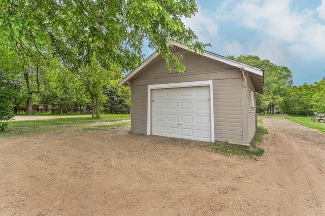 716 15th St NW, Bemidji, MN 56601 - detached garage featuring dirt driveway