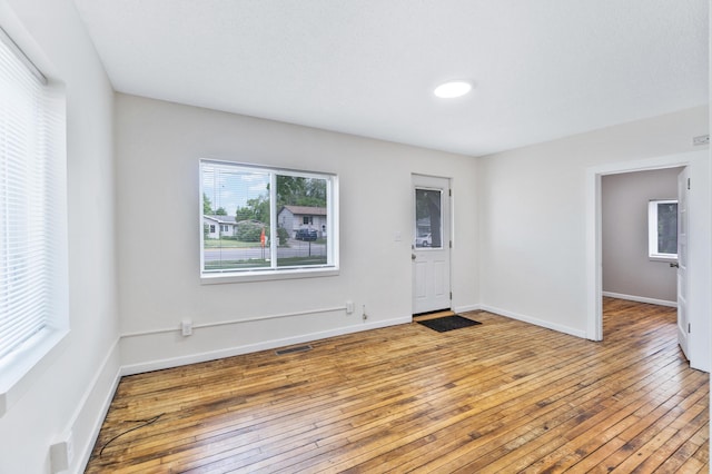 716 15th St NW, Bemidji, MN 56601 - entrance foyer with light wood finished floors and baseboards