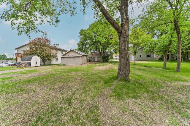 716 15th St NW, Bemidji, MN 56601 - view of green lawn featuring an outdoor structure