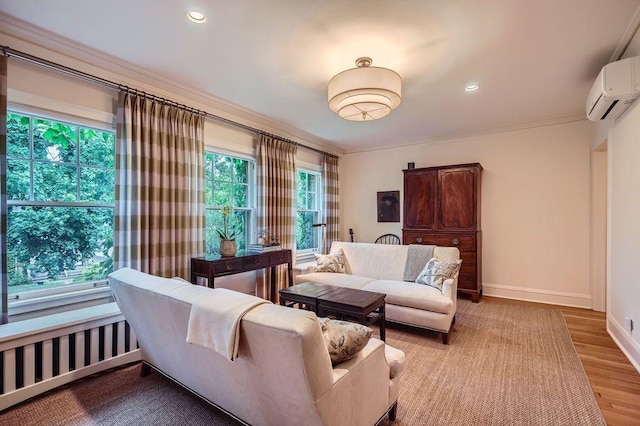 2517 Humboldt Ave S Unit 201, Minneapolis, MN 55405 - living area featuring an AC wall unit, healthy amount of natural light, light wood-style floors, baseboards, and ornamental molding