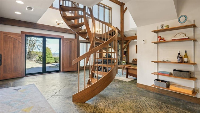 N30732 Square Bluff Rd, Blair, WI 54616 - stairs with baseboards, a towering ceiling, and recessed lighting