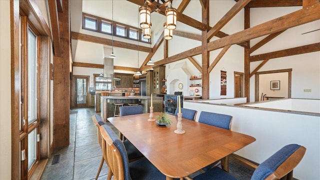N30732 Square Bluff Rd, Blair, WI 54616 - dining area with high vaulted ceiling and beamed ceiling