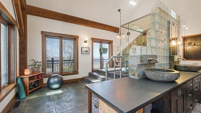 N30732 Square Bluff Rd, Blair, WI 54616 - interior space with baseboards, beam ceiling, and stairway