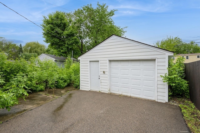 3425 Cleveland St NE, Minneapolis, MN 55418 - detached garage featuring asphalt driveway
