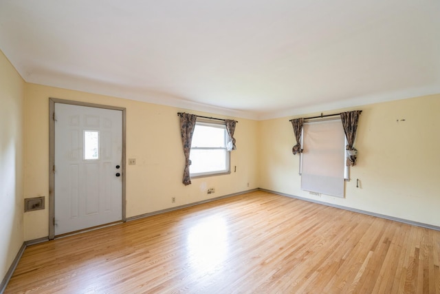 3425 Cleveland St NE, Minneapolis, MN 55418 - foyer with light wood-style flooring and baseboards