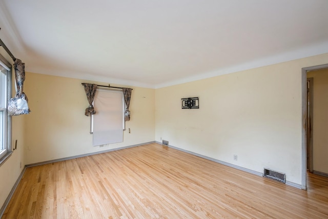 3425 Cleveland St NE, Minneapolis, MN 55418 - empty room with wood finished floors and baseboards