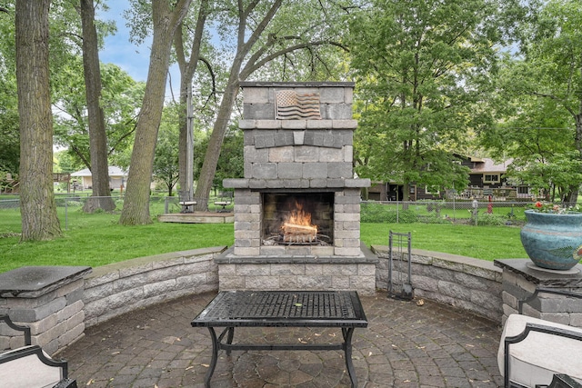 538 Silver Lake Rd NW, New Brighton, MN 55112 - view of patio / terrace featuring an outdoor stone fireplace