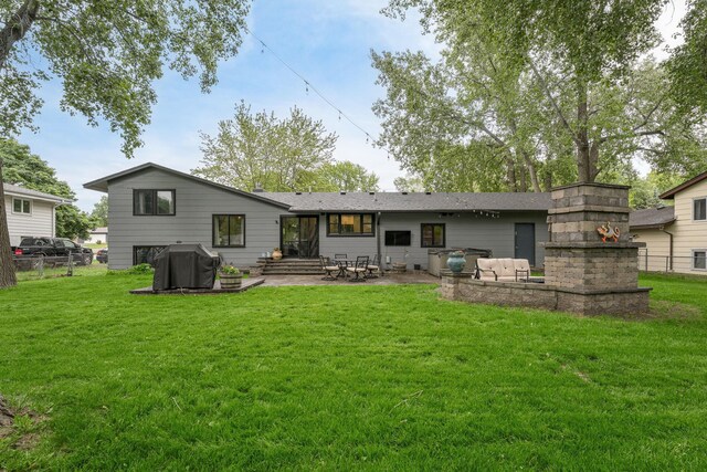 538 Silver Lake Rd NW, New Brighton, MN 55112 - rear view of house with a patio
