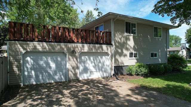 1715 Gateway Dr, Albert Lea, MN 56007 - view of side of property with a garage and driveway