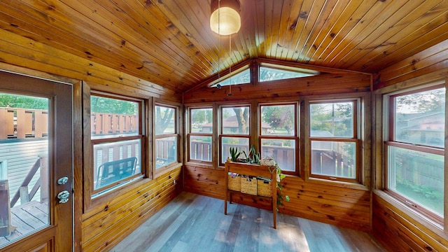 1715 Gateway Dr, Albert Lea, MN 56007 - sunroom / solarium with lofted ceiling, wooden walls, wood ceiling, wood finished floors, and healthy amount of natural light